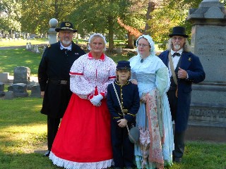 Civilians Ray, Jessie, Jo, BJ, and Tony attend ceremony